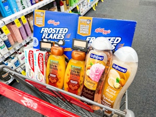 frosted flakes, toothpaste, eyeshadow, shampoo, and body wash in a cart