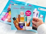 someone holding the Ulta 21 Days of Beauty calendar by the mailer
