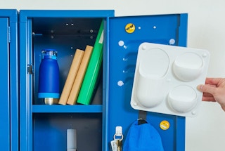 Velcro dots on a blue locker