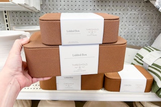 hand holding two studio mcgee shagreen boxes at target