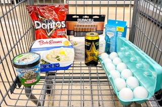 doritos, eggs, ice cream, energy drink, razors, and more in a cart