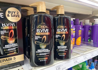 l'oreal total repair shampoo and conditioner on a shelf