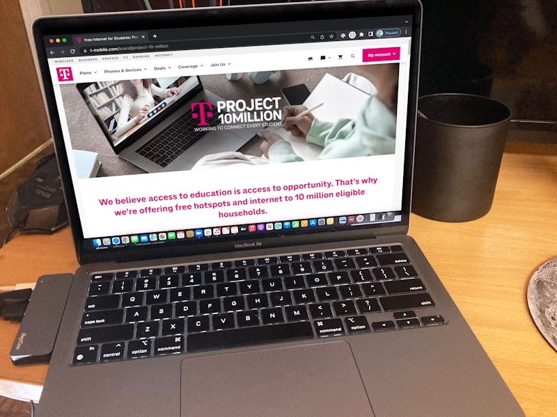 A laptop displaying the T-Mobile Project 10 Million landing page