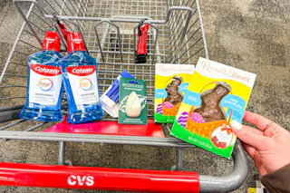 cvs shopping cart with colgate, ecotools, and russell stover products