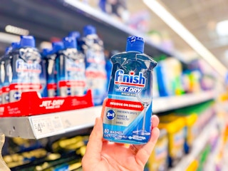 hand holding a bottle of Finish Jet-Dry