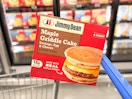 a box of jimmy dean griddle cakes on walmart cart in freezer aisle