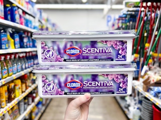 2 Clorox Wet Mop Pads (24 count) held up in center isle at Walmart