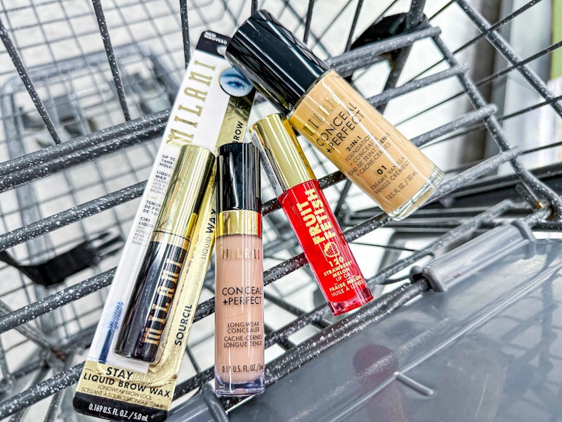 milani brow gel, concealer, lip gloss, and foundation in a cart