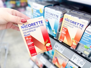 hand holding a box of Nicorette gum