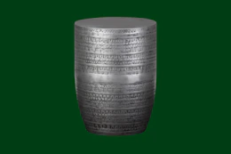 an accent table on a green background