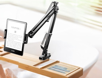 a tablet holder holding a Kindle 