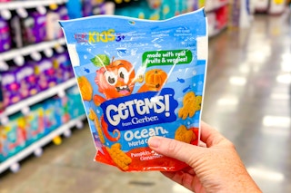 hand holding a pack of gerber get'ems! snacks