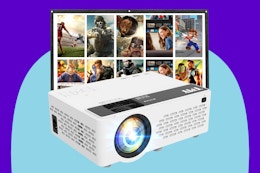  TMY 1080P Full HD Portable Mini Projector on a blue background.