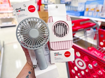 hand holding 2 dealworthy fans at target