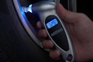 a tire pressure gauge on a tire