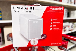frigidaire beauty & beverage cooler sitting on a target cart