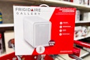 frigidaire beauty fridge sitting on a target cart