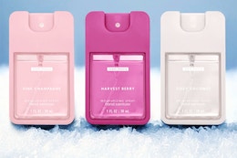 Lifestyle image of the Scent Theory Holiday Gift Set with snow in the background