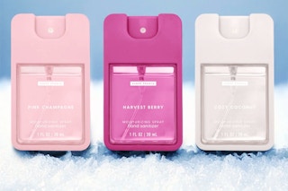 Lifestyle image of the Scent Theory Holiday Gift Set with snow in the background