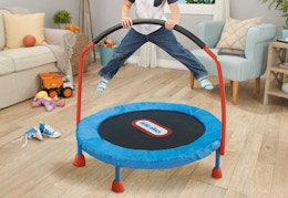 child jumping on a Little Tike 3-foot trampoline