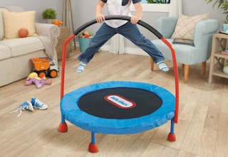 child jumping on a Little Tike 3-foot trampoline