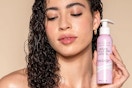 a woman holding the pacifica hair mask
