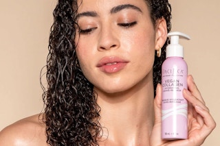 a woman holding the pacifica hair mask