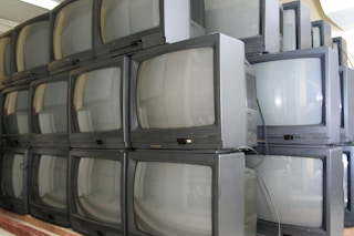 A pile of CRT TV sets, the kind involved in a 2023 settlement