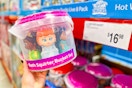 hand holding a disney bath set bucket