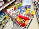 shopping cart with snacks and cereal boxes