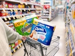 charmin and bounty products in a walgreens cart