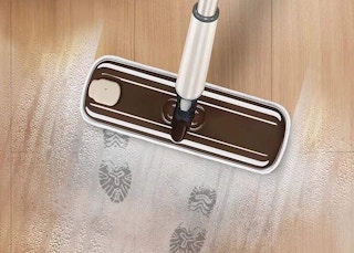 wet mop cleaning dirty floor