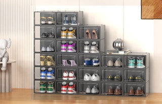 shoe storage containers against a wall in a room