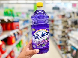 hand holding bottle of fabuloso