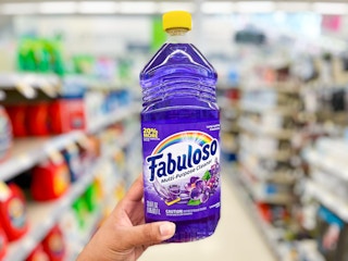 hand holding bottle of fabuloso