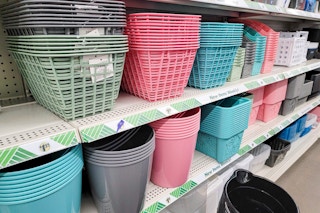 green, pink, and teal storage bins