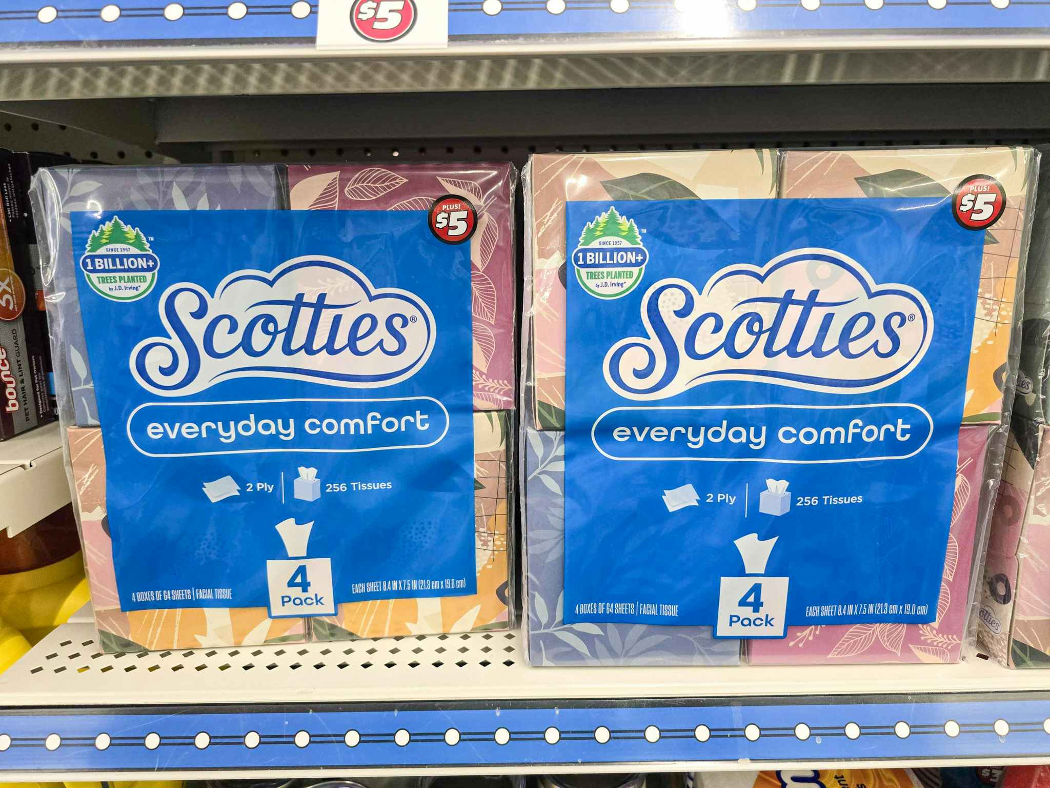 4-packs of scotties facial tissues on a shelf