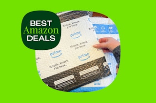 person opening an amazon box