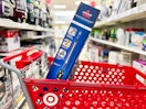 Bissell featherweight stick vacuum in front of a Target cart