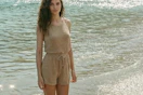 woman wearing romper at beach