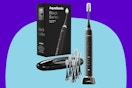 Aquasonic Black Series Ultra Whitening Toothbrush on a blue background.