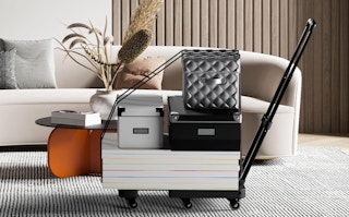 boxes on a dolly cart in a room