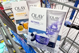 two Olay face care holiday packs in a Walmart cart