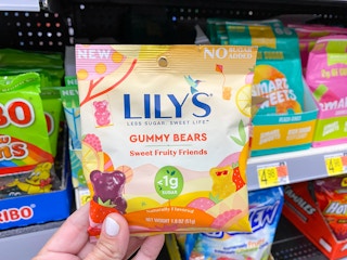 hand holding lily's gummy bears at walmart