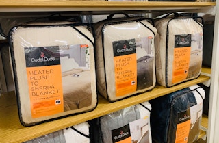 heated blankets in packaging on shelf