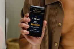 man holding deodorant stick