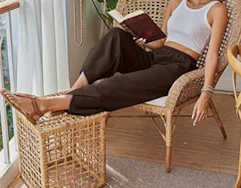 a person sitting in a chair reading a book