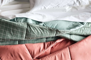 the big one comforter on a bed