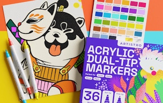 a pack of acrylic marker on top of a drawing with three markers