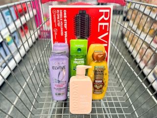 revlon one-step, loreal, garnier, and monday shampoo in a cart